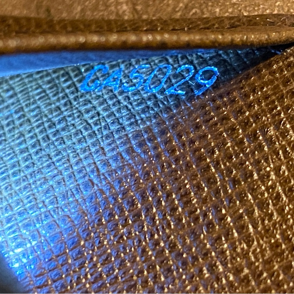 Louis Vuitton, Roman stud men’s card wallet - Picture 3 of 4